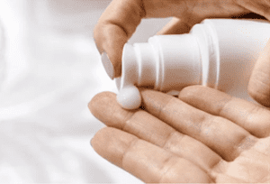 Applying lotion to moisturize skin